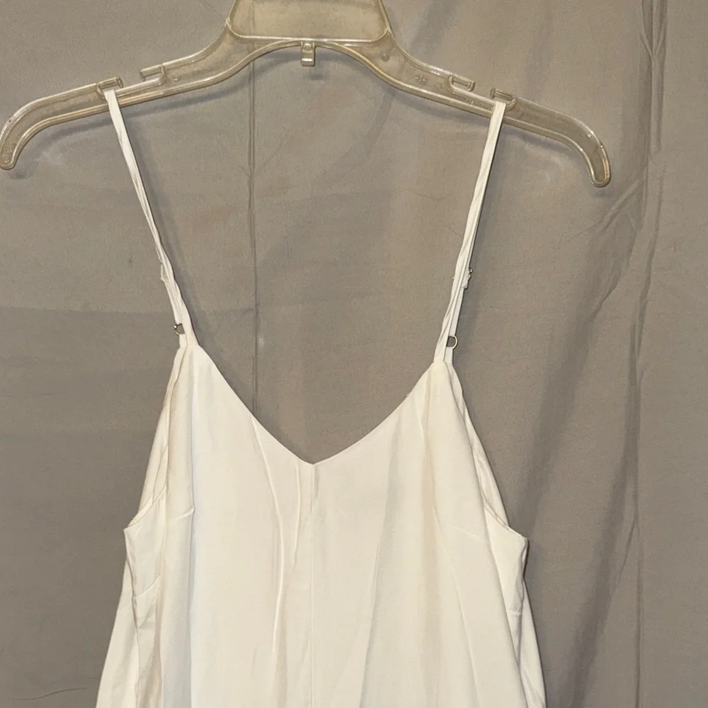 Elegant White Sleeveless Jumpsuit - Picture 4 of 13